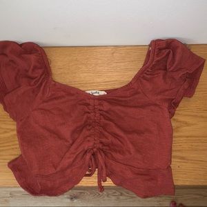 Beautiful Red shirt with a tie in the front